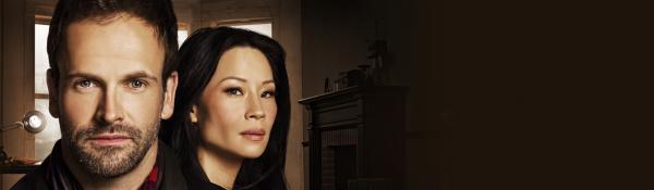 Bild 1 von 26: (1. Staffel) - Lösen Kriminalfälle auf höchst eigenwillige Weise: Sherlock Holmes (Jonny Lee Miller, l.) und Joan Watson (Lucy Liu, r.) ...