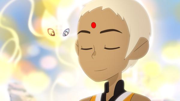 Bild 1 von 3: Sun von den Tao Twins meditiert. Mit dabei ist sein Genie Lotus.