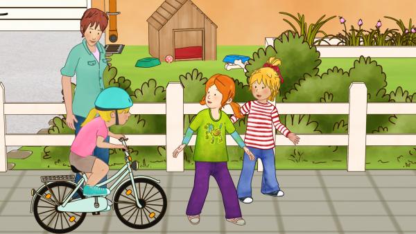 Bild 1 von 3: Conni (r.) und Anna (2.v.r.) wundern sich. Nicht nur auf den Straßen ist viel los, auch auf dem Bürgersteig.