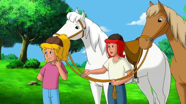 Bild 1 von 9: Tina (r.) wundert sich. Wieso bietet Bibi (l.) diesem fremden Jungen Hilfe an, wenn sie doch schnellstens zum Schloss reiten sollen?