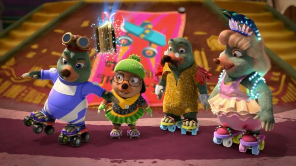 Bild 1 von 3: Moley ist baff erstaunt, seine Eltern als Favoritenpaar bei dem Rollschuhwettbewerb anzutreffen.