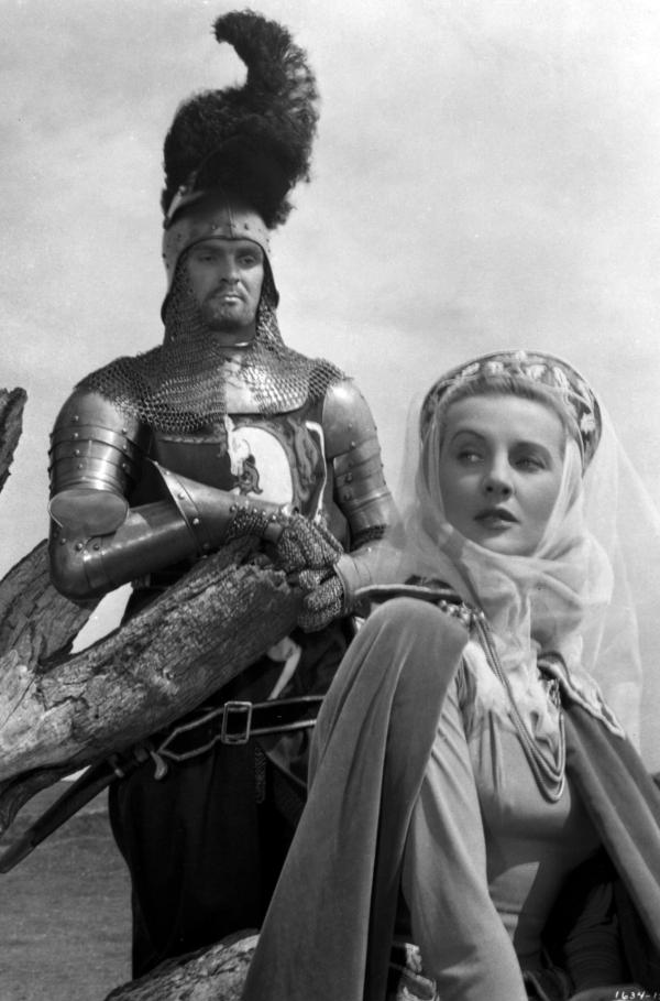 Bild 1 von 5: Mordred (Stanley Baker, li.) hat in Fee Morgan (Anne Crawford, re.) eine Verbündete.