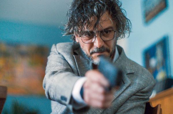 Bild 1 von 2: Inspektor Guerrini (Michele Venitucci)