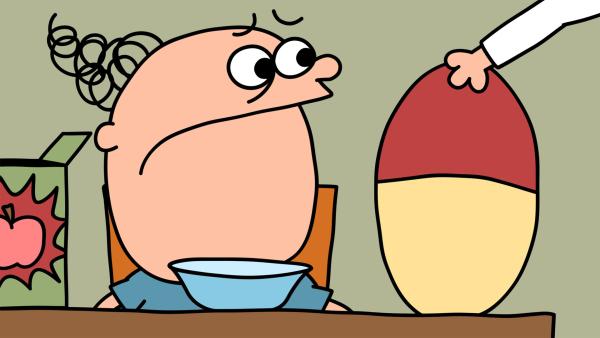 Bild 1 von 3: Trafalgar schaut skeptisch auf die riesengroße Vitaminpille, die er einnehmen soll.