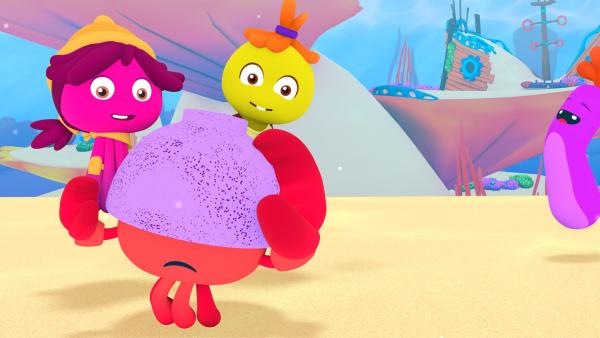 Bild 1 von 1: Alle müssen lachen, als sich Fin aus Versehen den Pudding über den Kopf kippt.