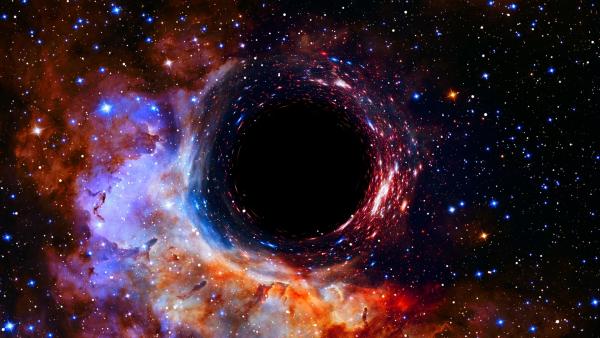 Bild 1 von 4: Im tiefen Weltall existieren sogenannte supermassereiche Schwarze Löcher.