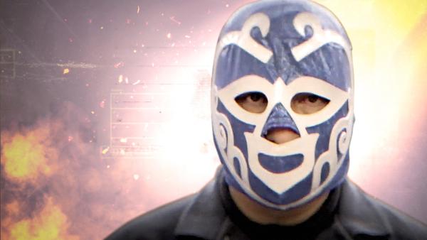 Bild 1 von 2: Namenloser Protagonist, der zum Schutz vor dem Erkanntwerden eine Maske trägt.