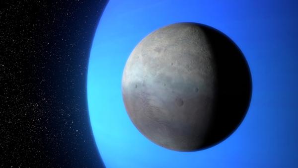 Bild 1 von 3: Triton ist der mit Abstand größte der 14 bekannten Monde Neptuns. Der Eismond umkreist den Planeten auf einer retrograden Umlaufbahn.