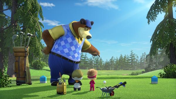 Bild 1 von 6: Der Bär in stilechten Golfklamotten.
