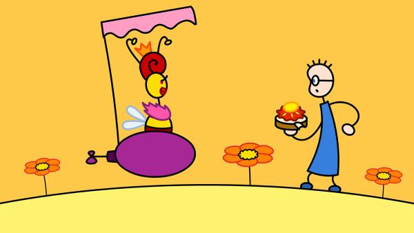 Bild 1 von 2: TOM will eigentlich nur sein Erdbeermarmeladebrot mit Honig finden, doch die Bienenkönigin kommt zu Besuch.