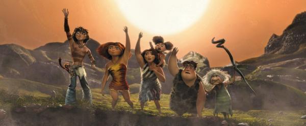 Bild 1 von 7: The Croods (and friends) wave to the family patriarch, as the near the end of their journey. From left: Belt (Chris Sanders), Guy (Ryan Reynolds), Eep (Emma Stone), Ugga (Catherine Keener), Sandy, Thunk (Clark Duke) and Gran (Cloris Leachman).