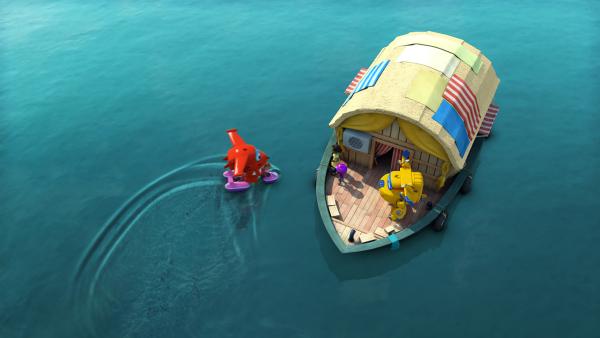 Bild 1 von 4: Mit dem Schwimmrad kommt Jett zum Hausboot von Rumas Mutter.