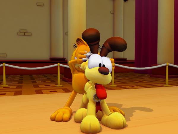Bild 1 von 2: Garfield beschließt, dass Odie beim Wettbewerb mitmachen soll und ernennt sich zu seinem Manager.