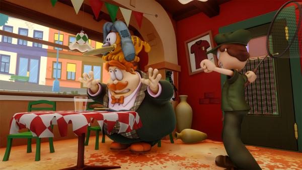 Bild 1 von 2: Jon nimmt einen neuen Job an: Er wird Hundefänger. Doch zu Garfields Ärgernis nimmt er seine Mahlzeiten zum Einfangen.