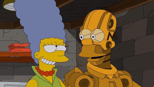 Bild 1 von 6: Endlich glücklich: Anders als der geklonte Homer ist der Roboter-Homer (r.) eine ganz andere Persönlichkeit als das Original und hilft Marge (l.) sogar bei der Hausarbeit ...
