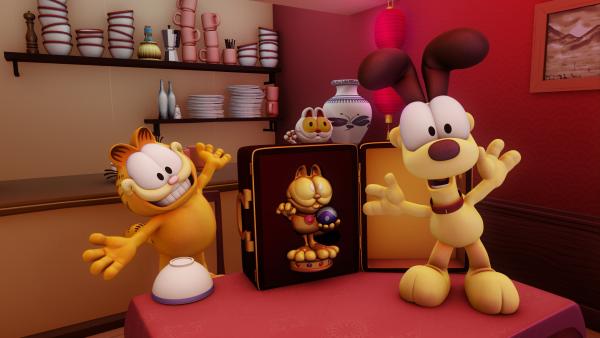 Bild 1 von 2: In Garfields Traum spielt er alle Rollen in seiner Show selbst. Anfangs ist er begeistert der alleinige Star zu sein, doch schon bald merkt er, wie anstrengend das ist.