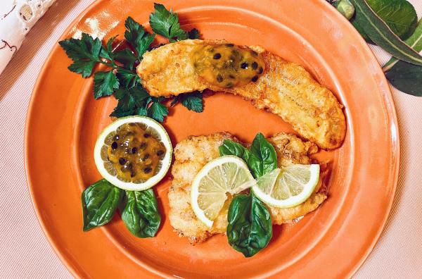Bild 1 von 4: Der Schwarze Degenfisch wird auf Madeira traditionell mit frittierter Banane und einer Soße aus Passionsfrüchten serviert.