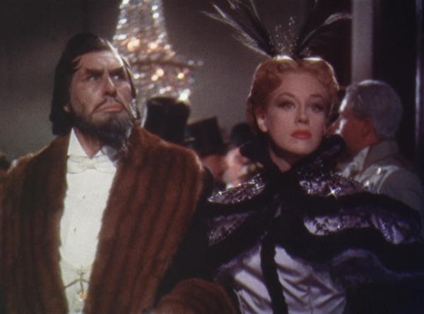 Bild 1 von 4: Svengali (Donald Wolfit, l.); Trilby (Hildegard Knef, r.)