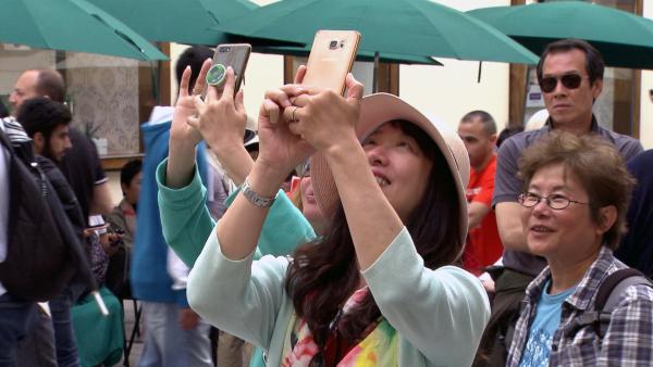 Bild 1 von 4: Touristen.