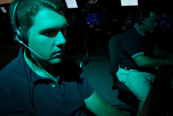 Bild 1 von 7: DRAMATIZATION: A technician, in a Starship City facility, searching for Earth-like planets.  (Photo Credit: Atlas Media Corporation/ Sevita Qarshi)