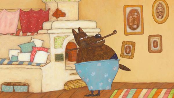 Bild 1 von 3: Der Wolf sucht im Ofen nach dem 7. Geißlein.