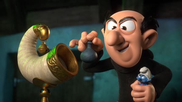 Bild 1 von 2: Gargamel erfindet das Horn des Überflusses und hofft, damit endlich alle Schlümpfe zu fangen.© KiKA/Peyo Productions, Dupuis Édition & Audiovisuell 2020 - Honorarfreie Verwendung gemäß AGB im redaktionellen Zusammenhang mit genannter Sendung bei Nennung \