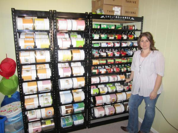 Bild 1 von 2: Tiffany Ivanovsky with stock pile.