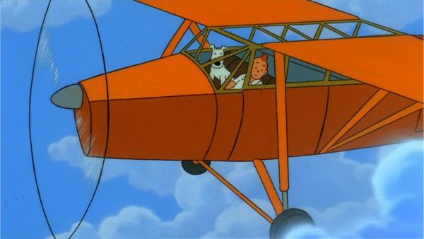Bild 1 von 3: Tim und Struppi machen sich mit dem Flieger auf den Weg nach Indien, doch plötzlich kommt es zu unerwarteten Komplikationen.