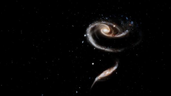 Bild 1 von 2: Das Weltraumteleskop Hubble zeigt uns unsere kosmische Nachbarschaft. Arp 273 besteht aus zwei kollidierenden Galaxien, die eine Rose bilden.