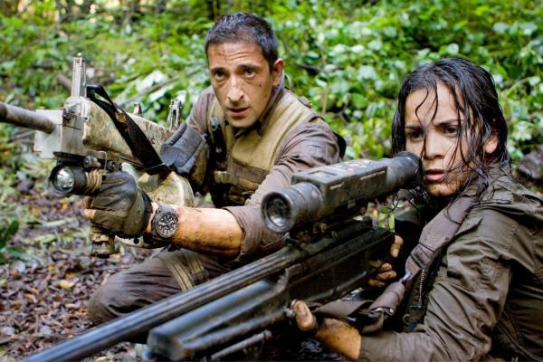 Bild 1 von 2: PRED-146Royce (Adrien Brody) and Isabelle (Alice Braga) take aim during their desperate battle against the alien Predators.