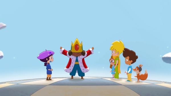 Bild 1 von 2: Der kleine Prinz und seine Freunde mit dem König von Allem, der sich kritisiert fühlt.