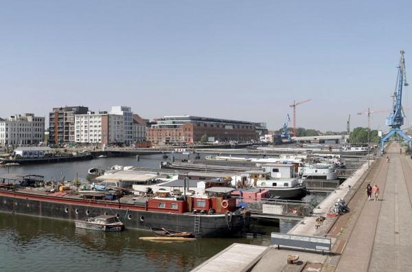 Bild 1 von 2: Ende des 19. Jahrhunderts kam es in Gent zu sozialen Umwälzungen: Die Textilindustrie verschaffte der Stadt zwar großen Reichtum, führte aber auch zu mehr gesellschaftlicher Ungleichheit.