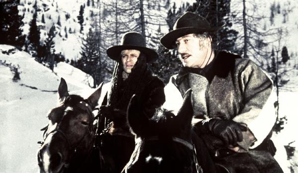 Bild 1 von 3: Sheriff Gideon (Frank Wolff, r.) soll Loco (Klaus Kinski, l.) ins Gefängnis überführen. Doch der Weg dorthin birgt tödliche Gefahren.