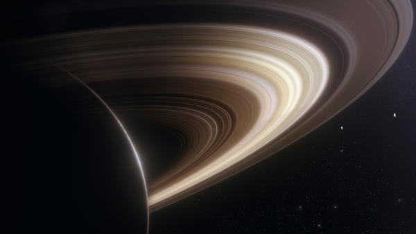 Bild 1 von 3: Saturns Ringe bestehen fast vollständig aus Eis. Sie sind so hell, dass sie das Sonnenlicht reflektieren und so auch von der Erde aus mit dem Teleskop zu erkennen sind.