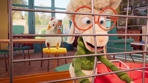 Bild 1 von 1: Billy findet sich im Käfig von Albert wieder, während dieser das Telefon hält.© KiKA/KiKA/2022 Sixteen South/Mikros Animation IP/Tencent - Honorarfreie Verwendung gemäß AGB im engen inhaltlichen redaktionellen Zusammenhang mit genannter Sendung bei Nennung \