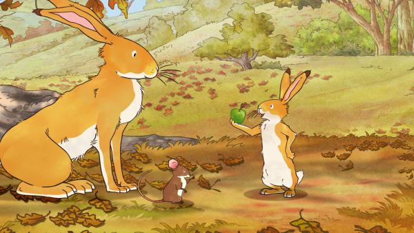 Bild 1 von 6: Der kleine braune Hase ist ganz stolz: Er hat es geschafft, den letzten Apfel des Jahres vom Baum zu pflücken.© KiKA/SLR Productions Australia Pty.Ltd./Scrawl Studios Pte Ltd./hr/ARD - Honorarfreie Verwendung gemäß AGB im redaktionellen Zusammenhang mit genannter Sendung bei Nennung \