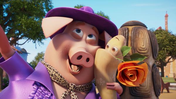 Bild 1 von 1: Reggie möchte Agnes zum Hochzeitstag mit einem Tänzchen überraschen - Schwein Clive bringt es ihm bei.© KiKA/KiKA/2022 Sixteen South/Mikros Animation IP/Tencent - Honorarfreie Verwendung gemäß AGB im engen inhaltlichen redaktionellen Zusammenhang mit genannter Sendung bei Nennung \