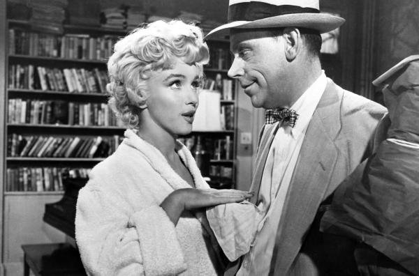 Bild 1 von 5: Seine neue Nachbarin (Marilyn Monroe) erweckt die Begierde des verheirateten Richard Sherman (Tom Ewell).