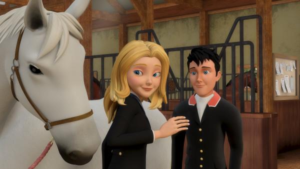 Bild 1 von 4: Irgendwie hat sich Stute Penny heute beim Turnier merkwürdig benommen. Selbst im Stall versucht sie Aufmerksamkeit von Wendy, die sich gerade mit Jerry unterhält, zu bekommen.