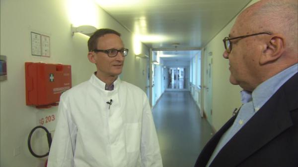 Bild 1 von 15: Sebastian Grün (links), DNA-Spezialist, und Oliver Bendixen.