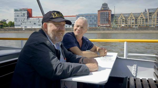 Bild 1 von 1: - 25 Jahre nach der ersten Begegnung von Klaus J. Behrendt (r) und Dietmar Bär (l) am Rheinufer im \