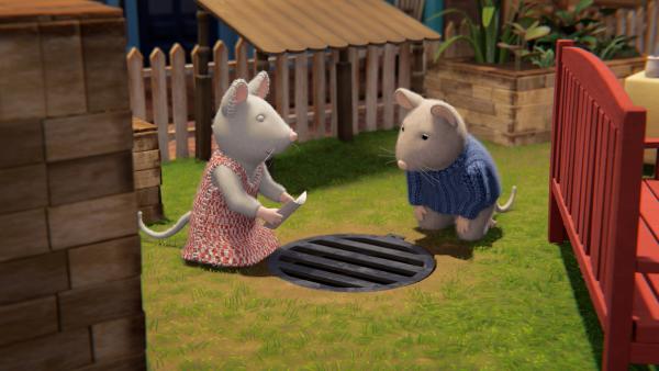 Bild 1 von 2: Julia (links) und Sam (rechts) hoffen auf Schnee. Deshalb stecken sie einen Brief mit der Bitte um Schnee in den Gully.© ZDF/Cielo Films/Caribara Production/SuperswissRed/M.A.R.K.13/ZDF Studios GmbH - Honorarfreie Verwendung gemäß AGB im redaktionellen Zusammenhang mit genannter Sendung bei Nennung \