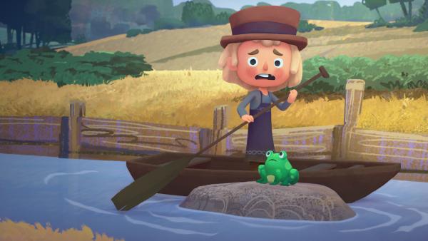 Bild 1 von 2: Bauer Juro will einem Frosch ins Wasser helfen.