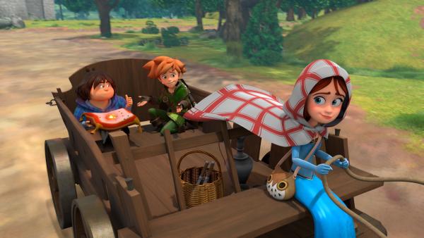 Bild 1 von 4: Tuck (l.), Robin (M.) und Marian (r.) müssen sich beeilen, denn sie wollen Derke so schnell wie möglich den besonderen Rubin bringen, durch den er sein Drachenfeuer zurückerlangt. Doch Prinz John ist ihnen dicht auf den Fersen - er will seinen edlen Stein zurück.