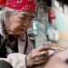 Die Matriarchin im Dorf der Tattoo-Frauen