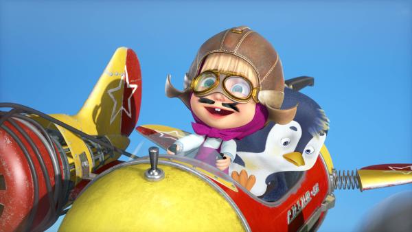 Bild 1 von 4: Leider benutzt Mascha beim Flugzeug des Pinguins Teile des Staubsaugers und des Rasensprengers, was die Flugeigenschaften des Geräts stark beeinträchtigt.